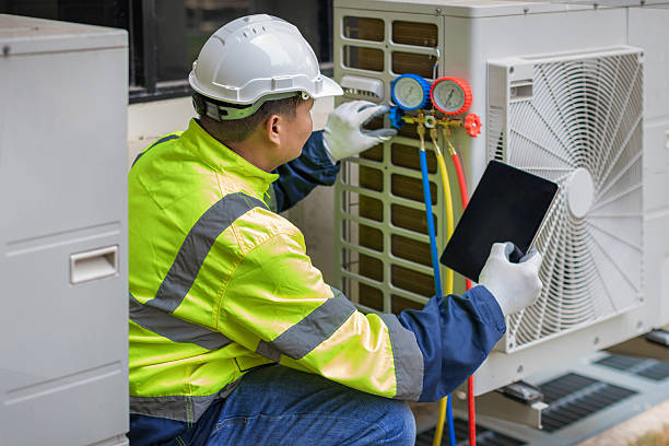 Professional Air Conditioning Repair technician working in Bloomingdale, NJ